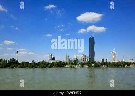 Austria, A-Vienna, Danube, Federal Capital, skyline of the Donau City, f.l.t.r. Danube Park with Donau Tower, Mischek Tower, residential tower, Saturn Tower, Commercial Tower, Ares Tower, Commercial Tower, UNO City with VIC Vienna International Centre and Austria Center Vienna, conference center, IZD Tower, Commercial Tower, DC Tower 1, Commercial Tower, skyscraper, highrise Neue Donau, apartment tower, river landscape, Danube landscape, Danube promenade, Danube bank, cumulus clouds Stock Photo