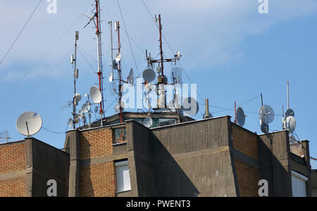 telecommunications, broadcasting, television, radio, high-rise residential building, many receiving antennas on the rooftop of a multi-family house in Novi Sad on the Danube, Serbia, Province Vojvodina, District South Backa, European Capital of Culture 2021 Stock Photo