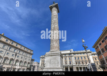 Marble Column of Marcus Aurelius in Piazza Colonna square in Rome, Italy. It is a Doric column about 100 feet high built in 2nd century AD and featuri Stock Photo