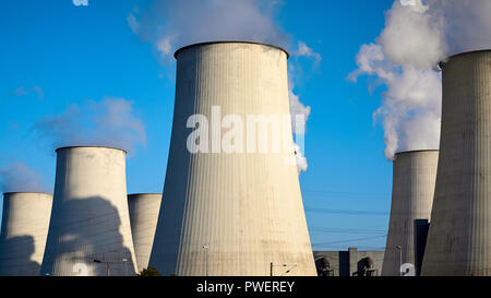Smoking chimneys against the blue sky, environmental pollution concept. Stock Photo
