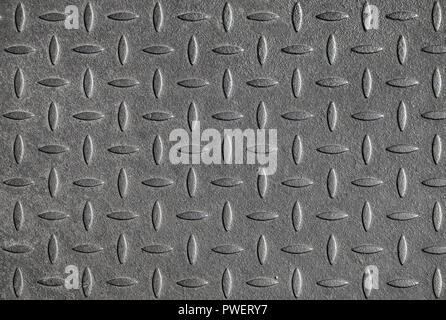 Gray diamond plate metal wall pattern. Background texture, frontal view Stock Photo