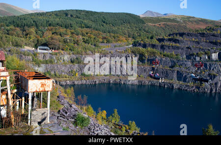 Zip World, a busy tourist attraction in the disused part of Penrhyn Quarry, near Bethesda, North Wales. Image taken in October 2018. Stock Photo