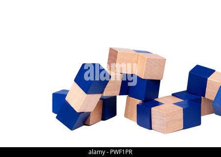 Complex mind challanging puzzle, blue wooden cubes forming a snake isolated on white background Stock Photo