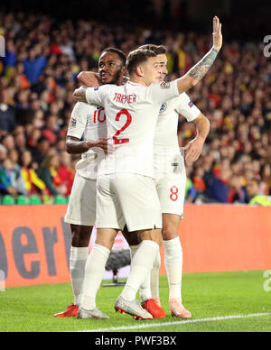 England's Raheem Sterling (left) celebrates scoring his side's first goal of the game during the Nations League match at Benito Villamarin Stadium, Seville. Stock Photo