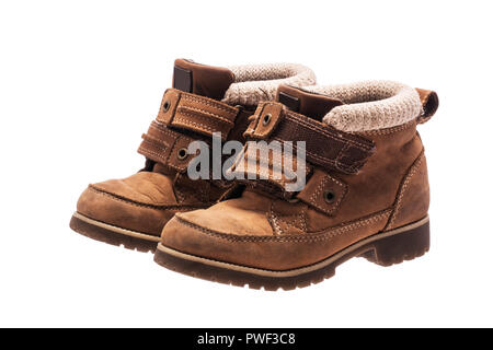 Children's baby shoes on white background. Orthopedic leather boots. Stock Photo