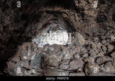 Interior of a lava tube at Craters of the Moon in Idaho Stock Photo