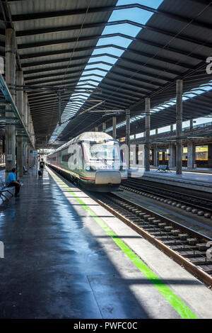 Cordoba, Spain - June 20:  Renfe TRAIN AT RAILROAD STATION IN CITY, Europe Stock Photo