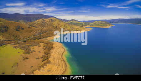 Aerial panorama of Blowering reservoir lake and mountains in NSW, Australia Stock Photo