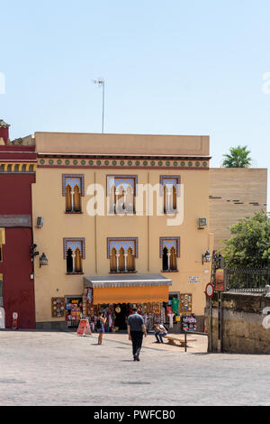 Cordoba, Spain - June 20: PEOPLE WALKING ON STREET AGAINST BUILDINGS IN CITY near Mosque Church, Andalucia Stock Photo
