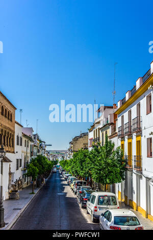 Cordoba, Spain - June 20 :  STREET AMIDST BUILDINGS AGAINST SKY, Europe Stock Photo