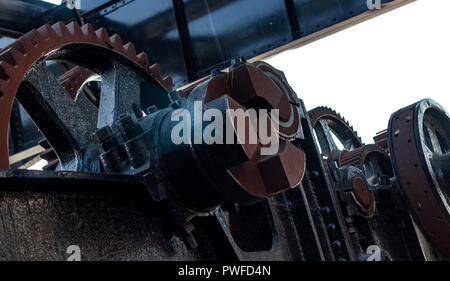 Rusty worn machinery cog gears and sprockets Stock Photo