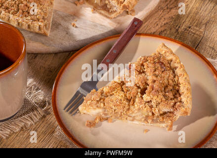 Overhead view of a slice of dutch apple pie on a plate Stock Photo