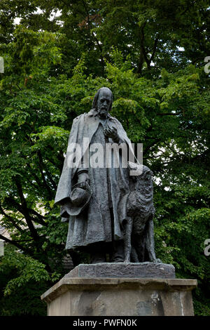 Statue of Alfred, Lord Tennyson with his dog Karenina, by G.F. Watts, Lincoln Cathedral, City of Lincoln, England, United Kingdom Stock Photo