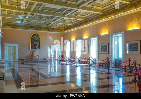 Castelgandolfo, Italy - April 21, 2017: The  throne  hall of he Apostolic palace, summer residence of the Popes