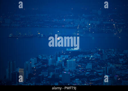 Penang Island & Mainland Penang overview from Penang Hill at Dawn with City lights Stock Photo