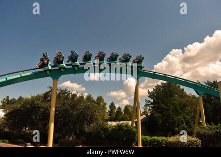 Orlando, Florida. September 21, 2018. People enjoying Kraken funfair rollercoaster at Seaworld Ocean Marine Theme Park. Stock Photo