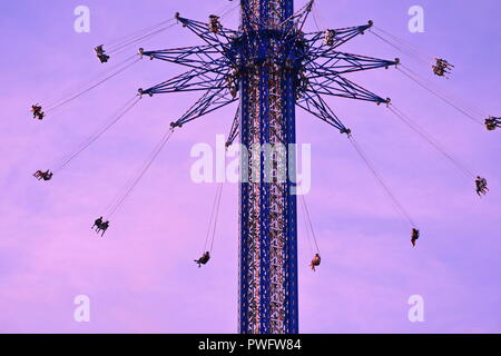 Orlando, Florida. September 27, 2018. People enjoying Star Flyer on sunset backround at International Drive Area. Stock Photo