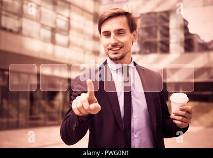 Business man pressing high tech type of modern buttons on virtual background Stock Photo