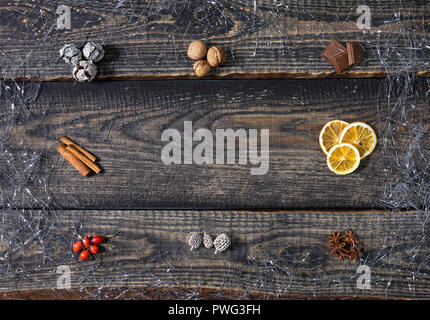 Beautiful Christmas composition on dark wooden background. Flat lay, top view Stock Photo