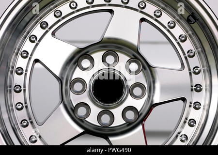 Close up shot of wheel rim, shiny, alloy, isolated on a white background Stock Photo