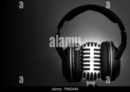 Sound theme in black and white with retro microphone. Stock Photo