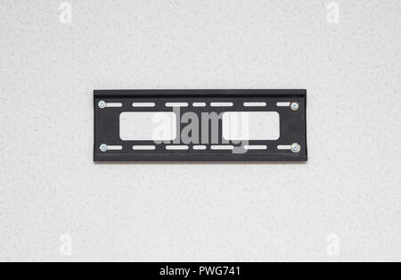 mount for TV LSD on the wall, close-up, white background, TV mount Stock Photo
