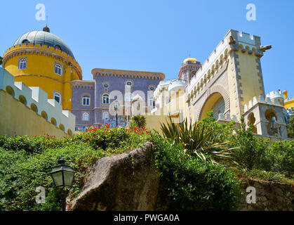 Sintra Palacio da Pena, view of the colorful landmark palace, the Palacio  da Pena sited on a hill to the south of Sintra, Portugal Stock Photo - Alamy