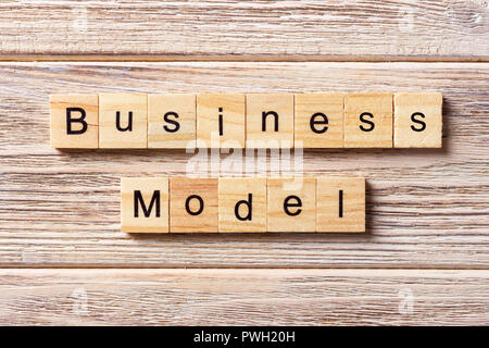 Business model word written on wood block. Business model text on table, concept. Stock Photo