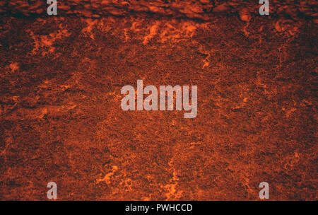 piece of wall of red, orange and yellowish shades, the whole surface is mottled curved small lines and patterns, old texture, shabby appearance, Stock Photo