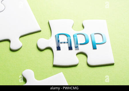 The Word App In Missing Piece Jigsaw Puzzle Stock Photo