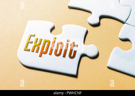 The Word Exploit In Missing Piece Jigsaw Puzzle Stock Photo