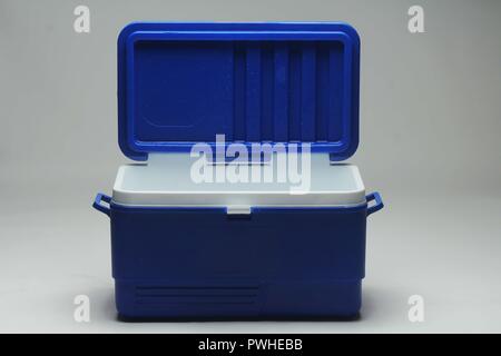 Opened Handheld blue refrigerator, ice box. Isolated on white background. cooler Stock Photo