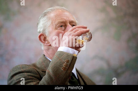 The Prince of Wales, known as the Duke of Rothesay while in Scotland, takes part in a whisky tasting during a visit to the Royal Lochnagar Distillery at Crathie on Royal Deeside. Stock Photo