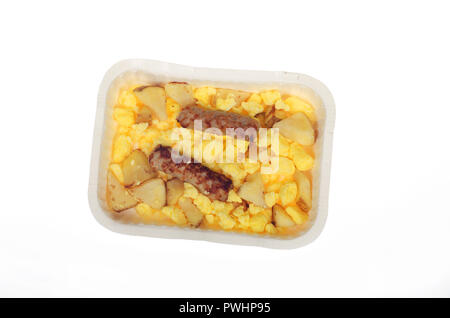 Hot cooked from frozen Aunt Jemima scrambled eggs with roasted potatoes and sausage links in tray on white Stock Photo