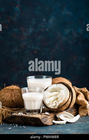 Fresh coconut milk in glass, vegan non dairy healthy drink Stock Photo