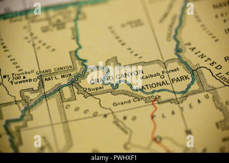 The Grand Canyon is the center of focus, printed on an old map. Stock Photo