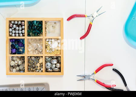 Tools, beads and accessories for jewelery and jewelry Stock Photo