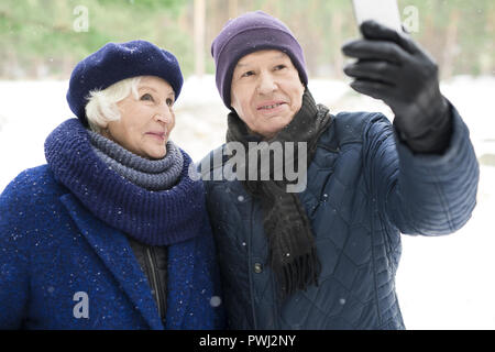 Senior Couple Taking Photo Stock Photo