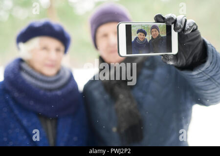 Senior Couple Taking Selfie Stock Photo