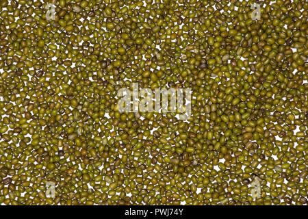 Lot of whole dry green mung beans flatlay isolated Stock Photo