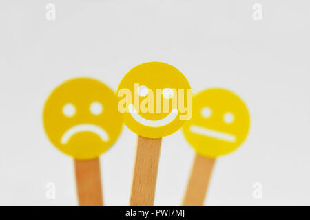 Yellow smiley faces with positive, neutral and negative expression - Positivity concept Stock Photo