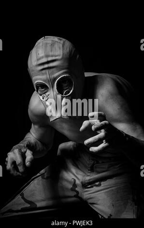 Man zombie in gas mask in black and white. Stock Photo