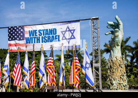 Miami Beach Florida,Holocaust Memorial,Israel Solidarity Rally,Jew,Jewish state,Kenneth Treister,sculptor,stage,flags,Zionism,religion,tradition,Middl Stock Photo
