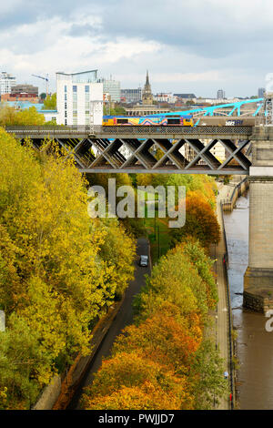 GB Railfreight class 66 locomotive and freight train crossing the river Tyne on the King Edward bridge, Newcastle upon Tyne, England, UK Stock Photo