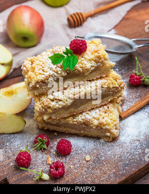 stack of square pieces of baked apple pie, top view,  crumble cake Stock Photo