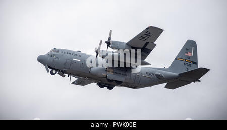 181013-Z-FC129-573  Charleston, W.Va.  (Oct. 13, 2018)  A C-130 H3 Hercules from the 130th Airlift Wing takes flight during the Yeager Airport 2018 Salute To Our Veterans and First Responders Air Show held in Charleston, West Virginia Oct. 13, 2018. Yeager Airport is named after retired United States Air Force General Charles “Chuck” Yeager who made a special appearance during the event commemorating the 71st anniversary of his record-setting flight breaking the sound barrier in 1947.  (West Virginia National Guard photo by Bo Wriston) Stock Photo