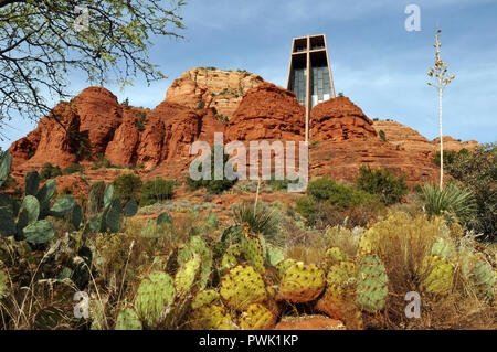 Completed in 1956, the Chapel of the Holy Cross in Sedona, Arizona is an architectural landmark set amongst the area's dramatic red rock formations. Stock Photo