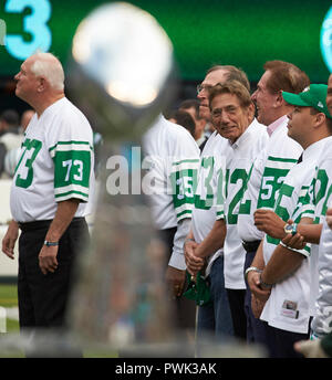 The New York Jets' Joe Namath, who did away with his famed Fu Manchu  mustache for the sake of a TV commercial several weeks ago, gets the  attention of three girls who