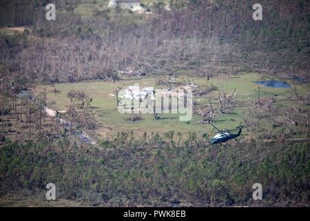 Panama City, Florida, USA. 15th Oct 2018. U.S President Donald Trump, riding in Marine One views damage in the aftermath of Hurricane Michael across the panhandle of Florida October 15, 2018 outside Panama City, Florida. Credit: Planetpix/Alamy Live News Stock Photo