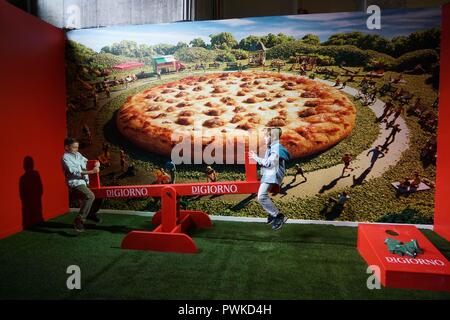 New York, USA. 16th Oct, 2018. Children play at the Museum of Pizza in Brooklyn, New York, the United States, on Oct. 16, 2018. The Museum of Pizza is a temporary interactive art museum in the theme of pizza. Credit: Lin Bilin/Xinhua/Alamy Live News Stock Photo